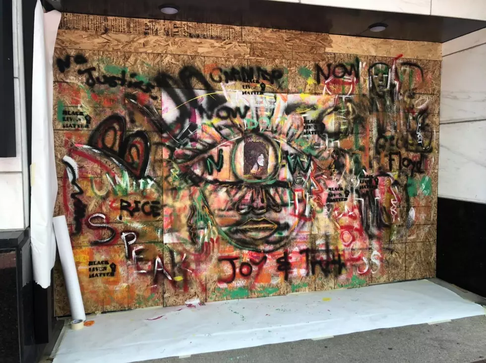 Artists Paint Tributes On Boarded Up Windows In Downtown Kalamazoo