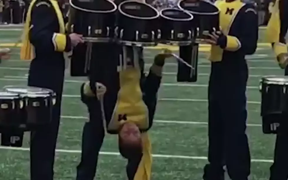 U of M Drummer Goes Upside Down in Halftime Show [VIDEO]